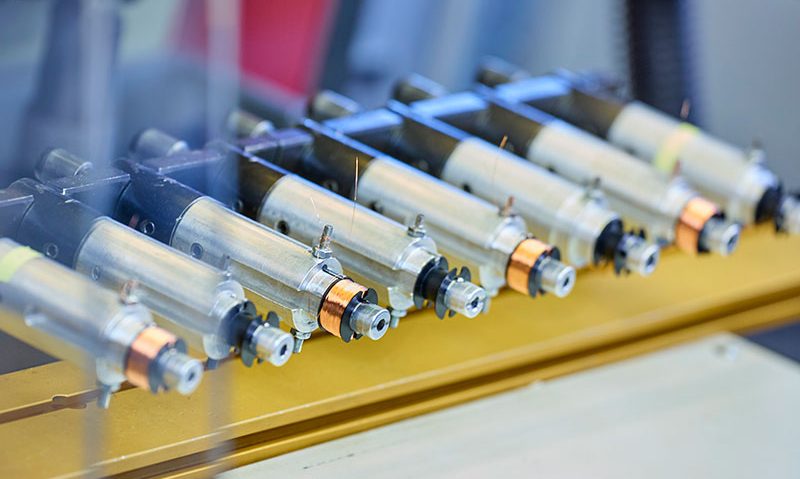Magnetspulen in Serienfertigung bei CHK Elektronik – induktive Bauteile mit Kupferwicklung